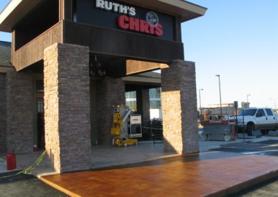 A building with a wooden floor and a sign